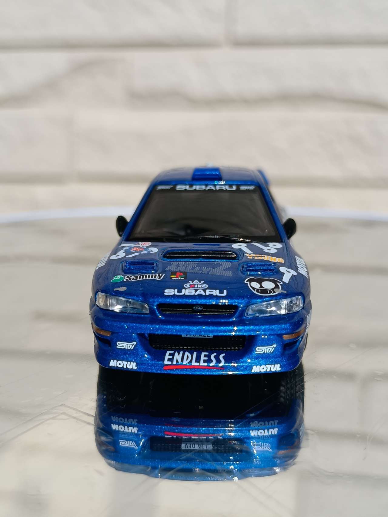 1/64 スバル インプレッサ WRC99 アクロポリス・ラリー 2000 #23(左